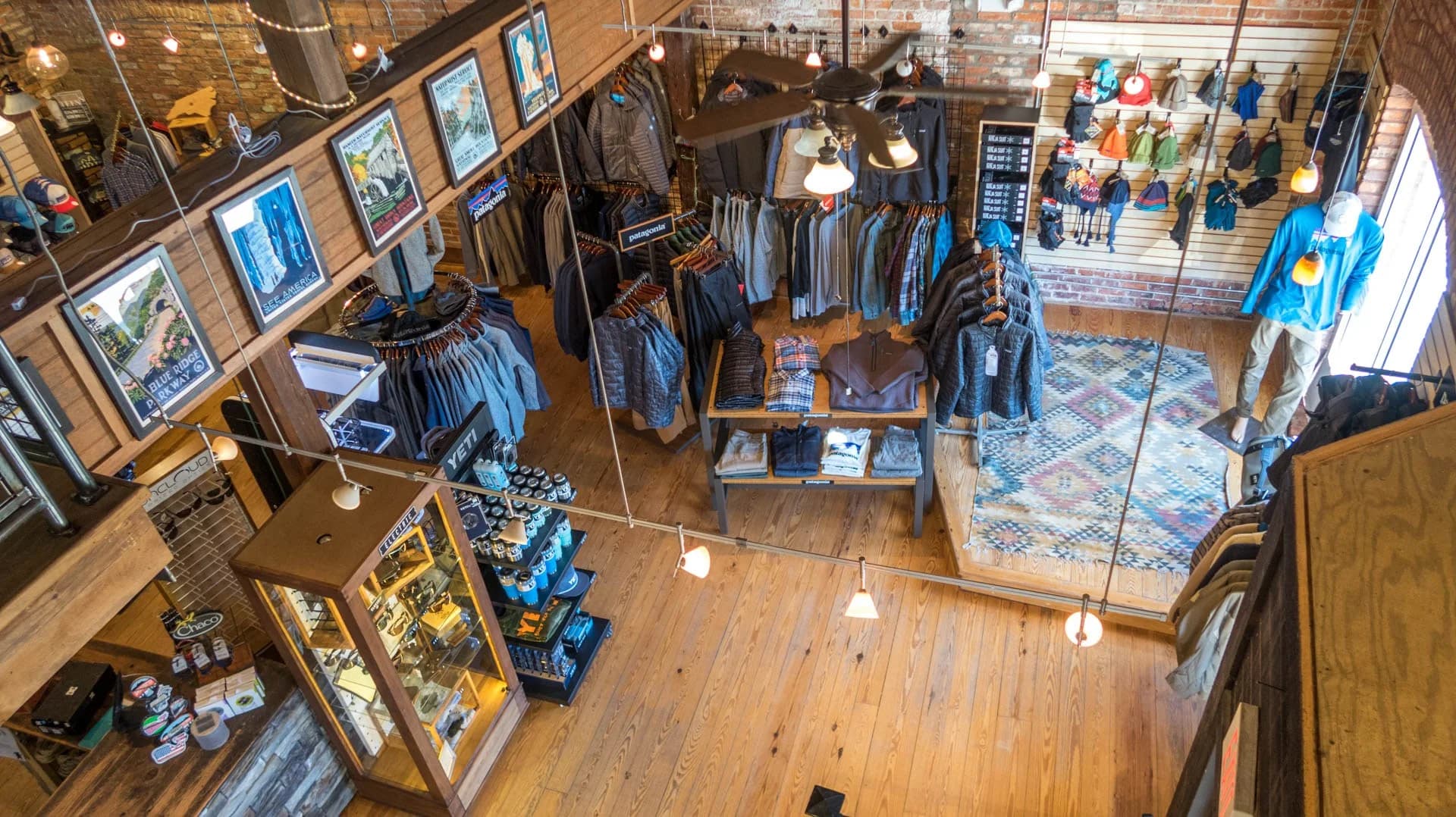 The wood-floored shop and outdoor gear displays inside Apex Outfitter