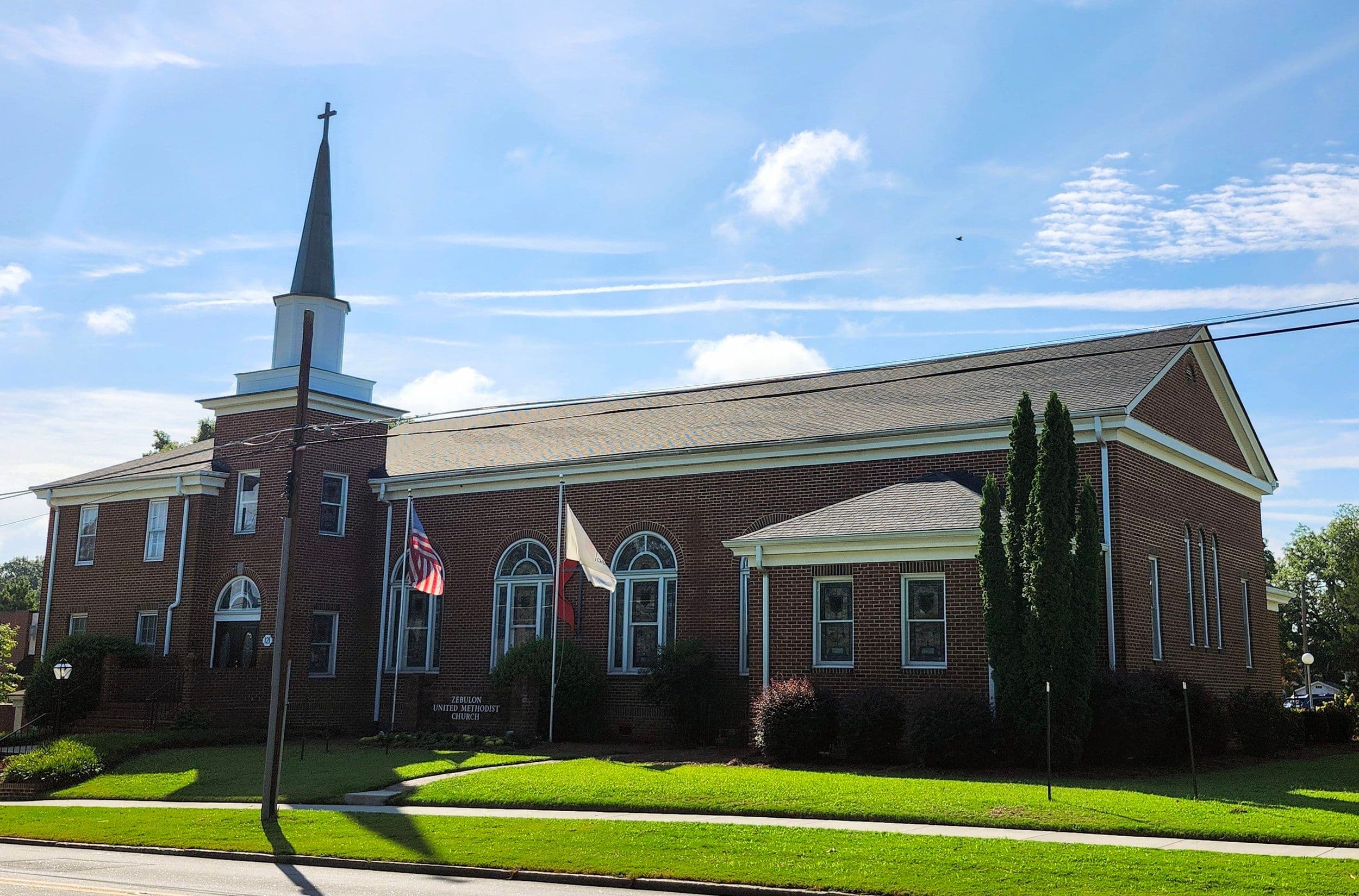 The brick exterior and entrance of Zebulon United Methodist Church